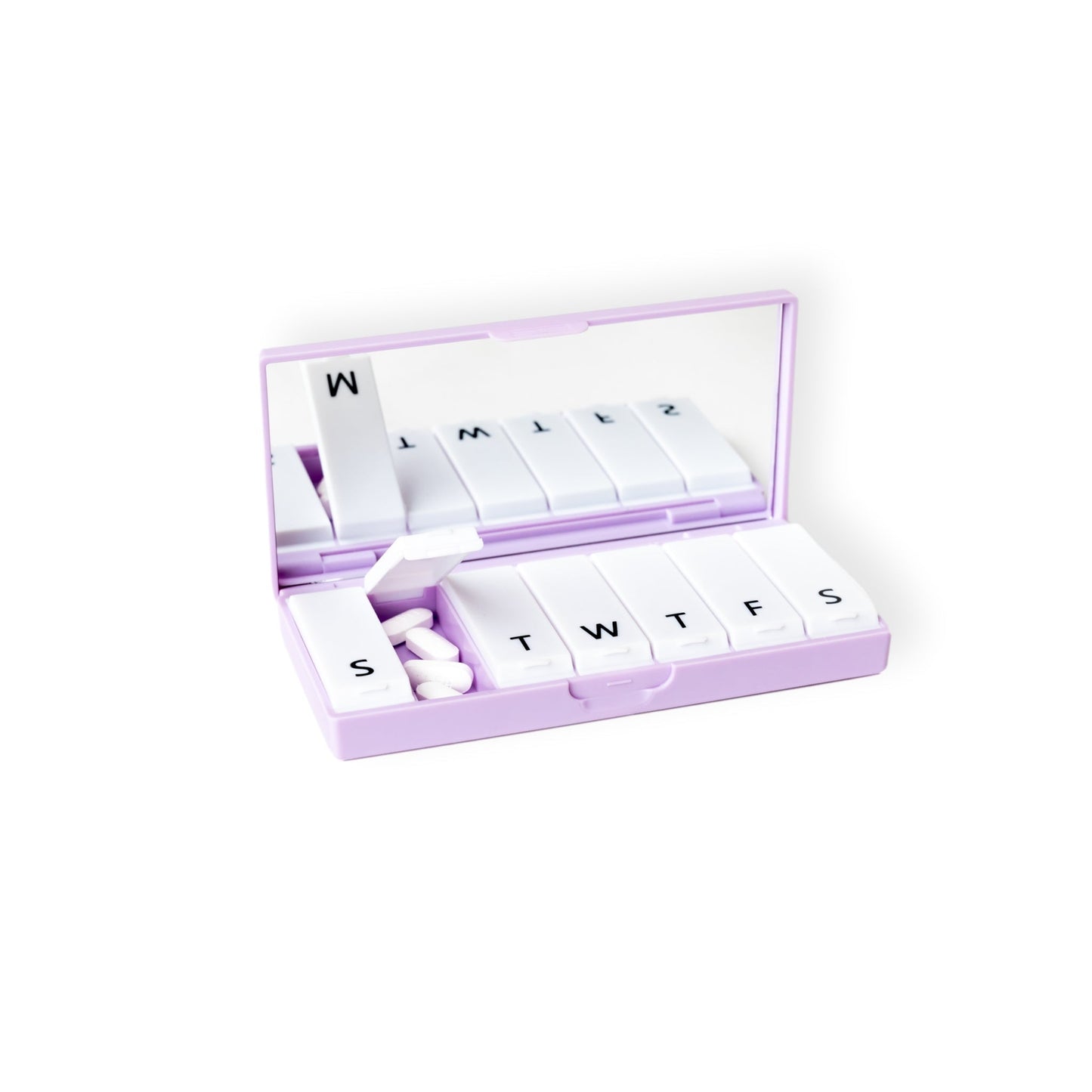 Lilac pill organizer box with open lettered compartments and small tablets