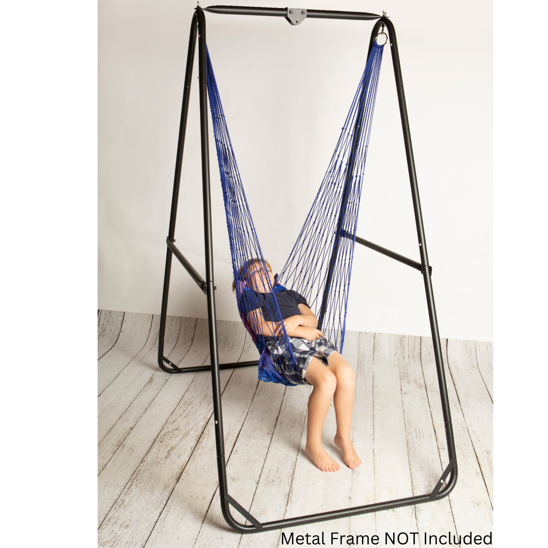Blue kids hammock chair swing with woven rope and black stand frame, child seated.