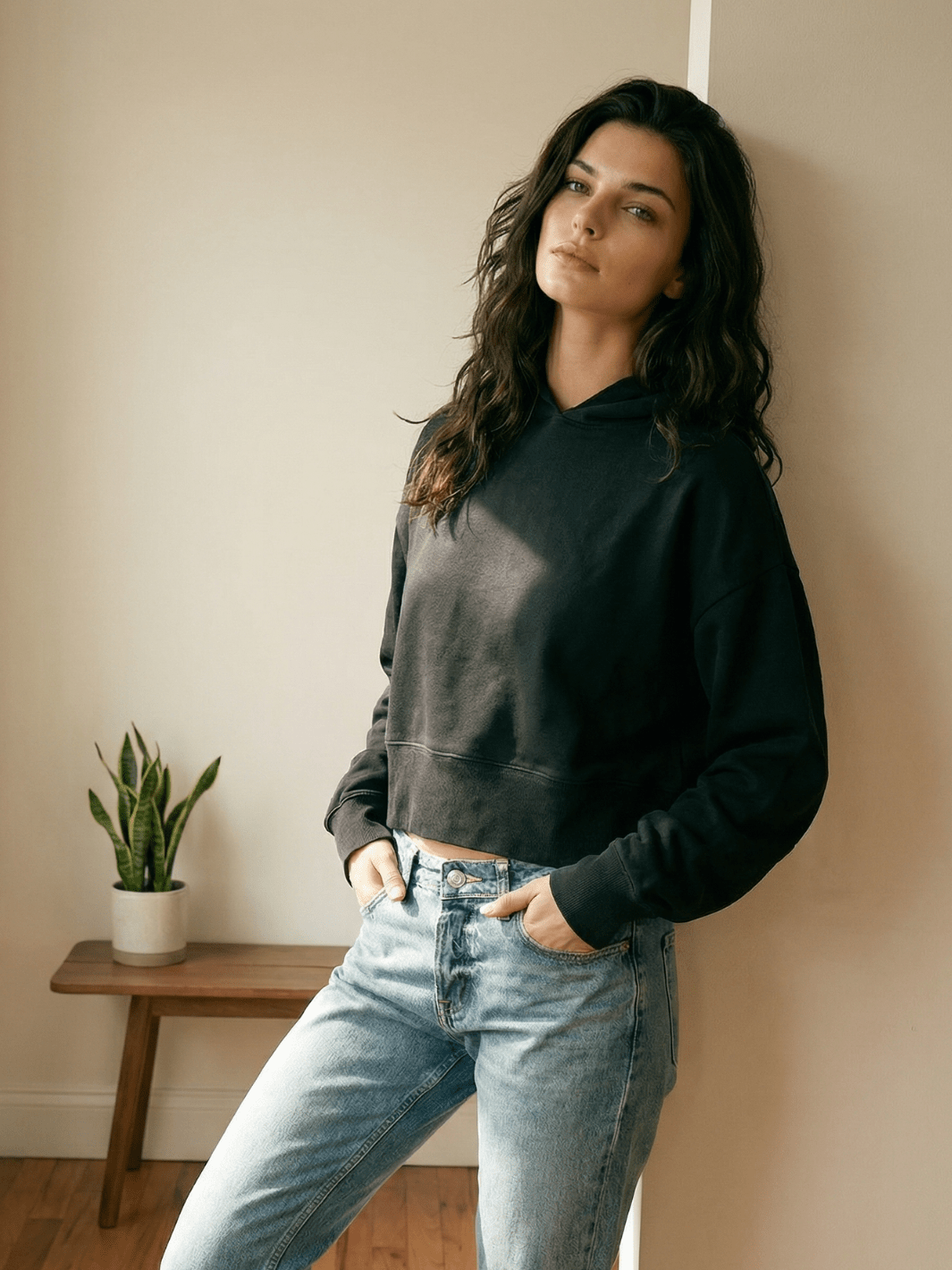Black cropped pullover hoodie with hood and kangaroo pocket, long sleeves