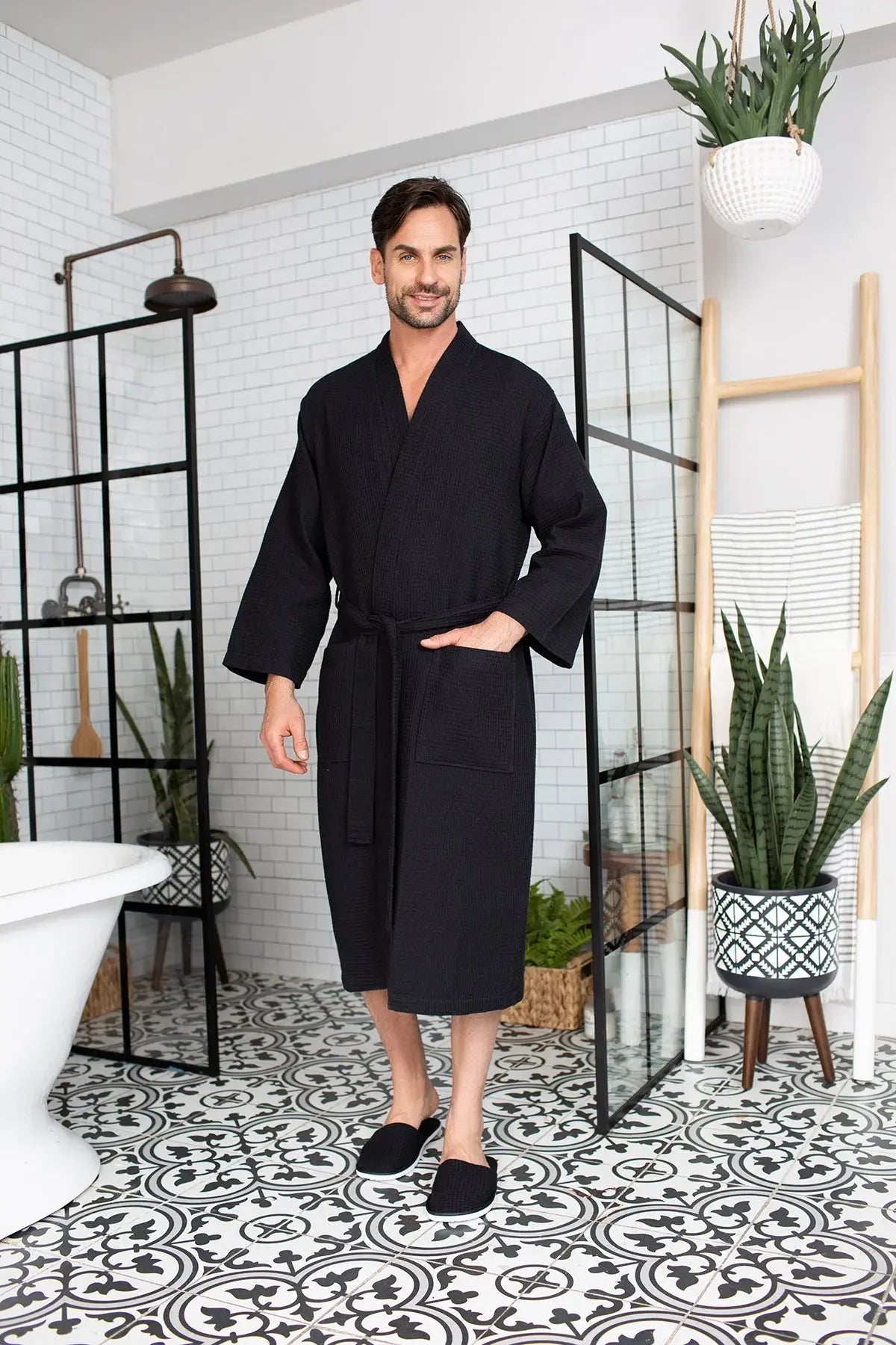 Men's waffle spa bathrobe in black, V-neck belted waffle-knit robe with long sleeves.