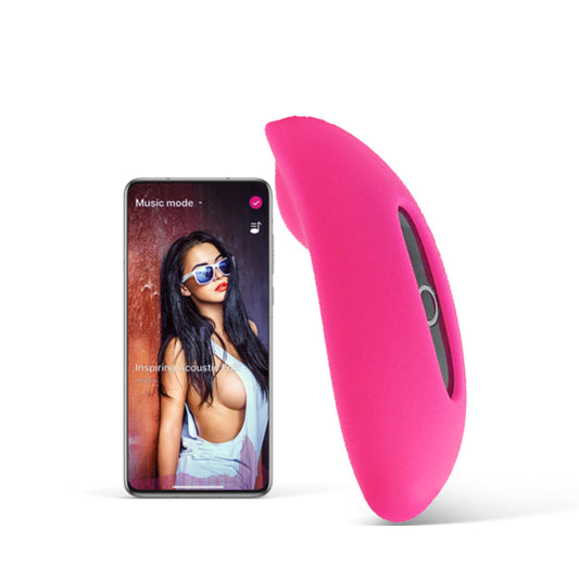 Pink silicone personal massager with oval shape and central dark opening
