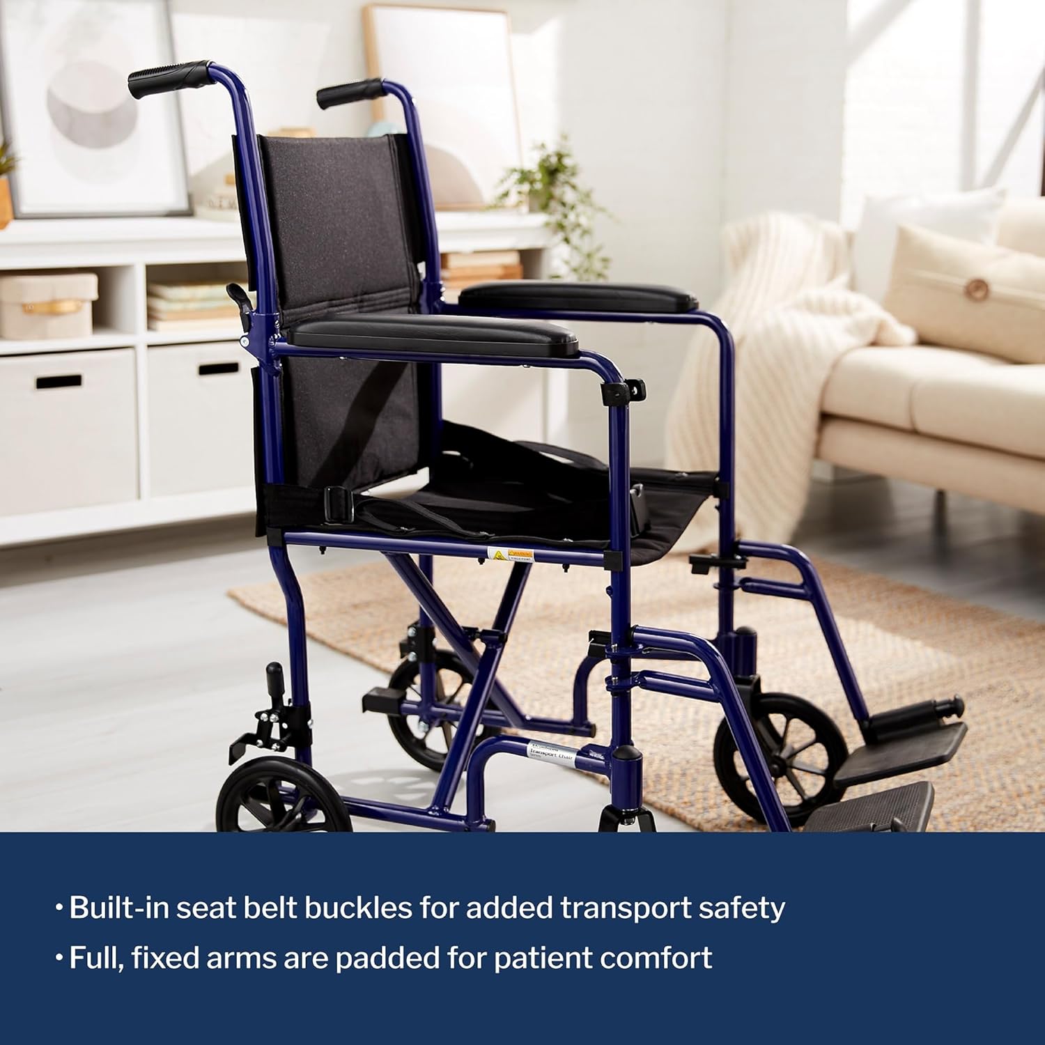 Transport chair with blue frame, built-in seat belt buckles, and padded fixed arms
