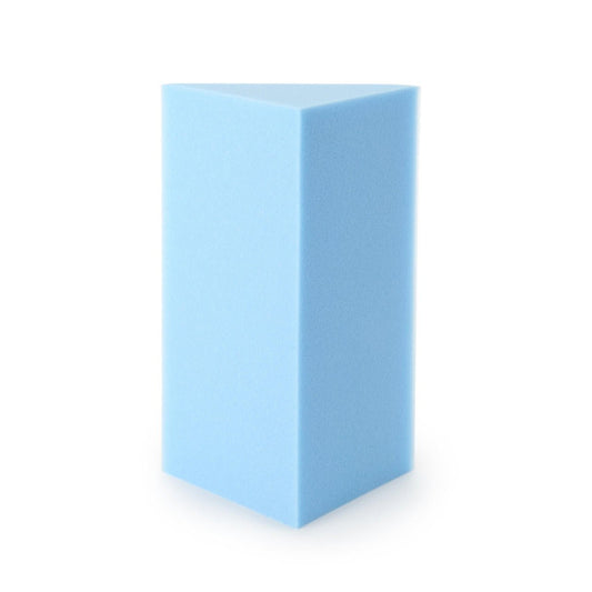 Blue foam wedge pad block with flat side and tapered profile.