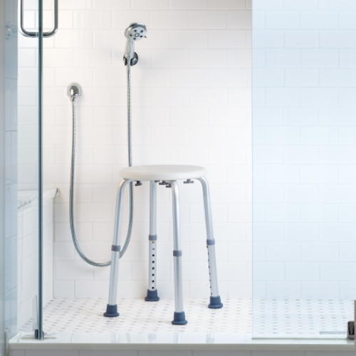McKesson shower stool with round seat and height-adjustable aluminum legs