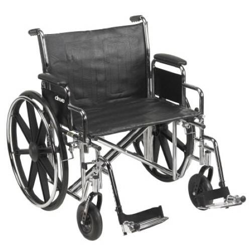 24in wheelchair with padded dark seat and back, swing-away footrests, detachable desk arms
