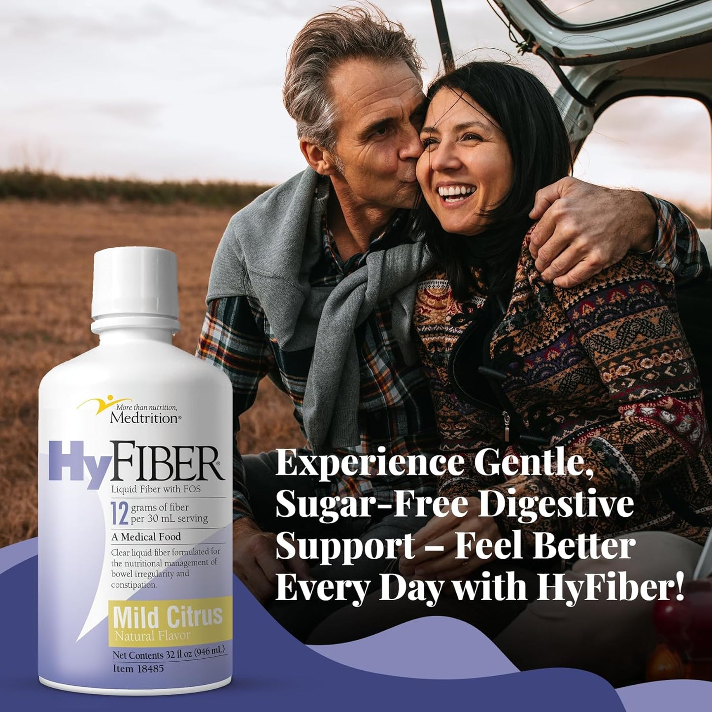 HyFiber mild citrus liquid fiber bottle next to a smiling couple outdoors