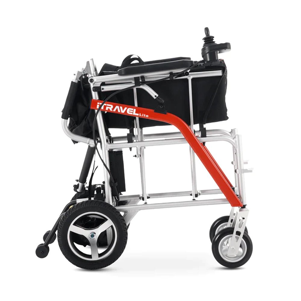 Compact folding electric wheelchair with black upholstery and silver wheel rims