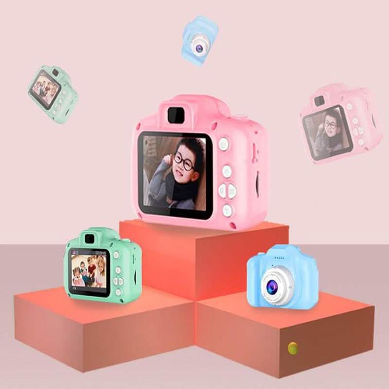 Pink mini children's digital camera with LCD screen; blue and green cameras shown