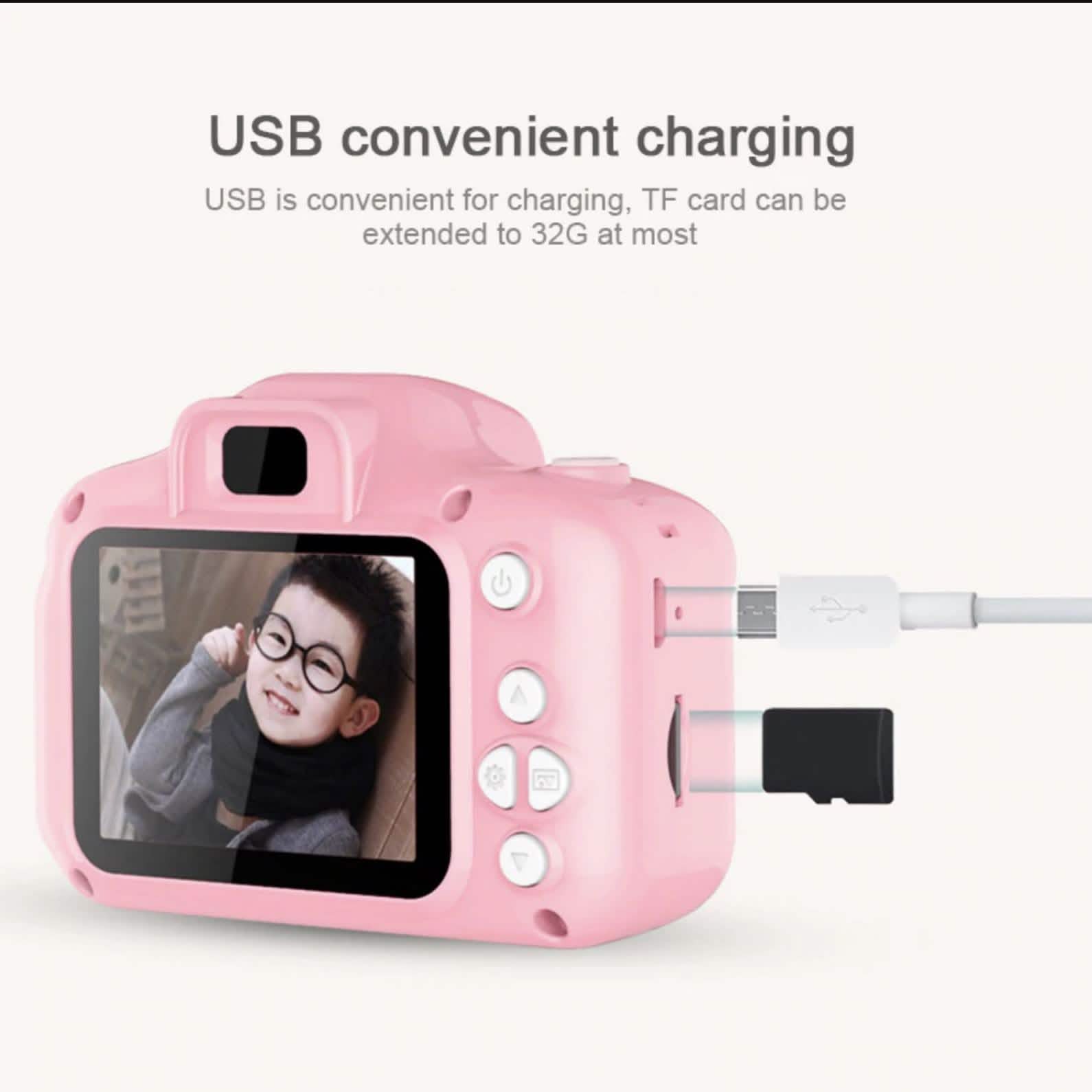Pink mini digital camera with LCD screen and USB cable charging