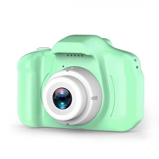 Green mini digital camera with large front lens and top grille