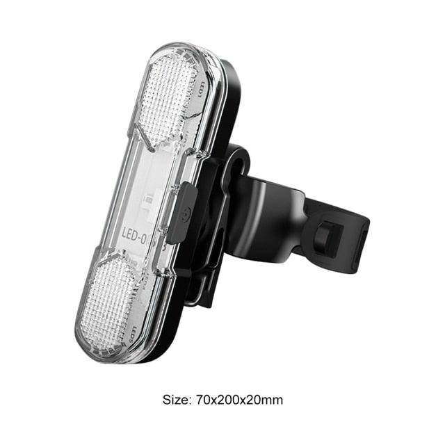 Mini bike headlight with clear LED lens and black handlebar clamp mount