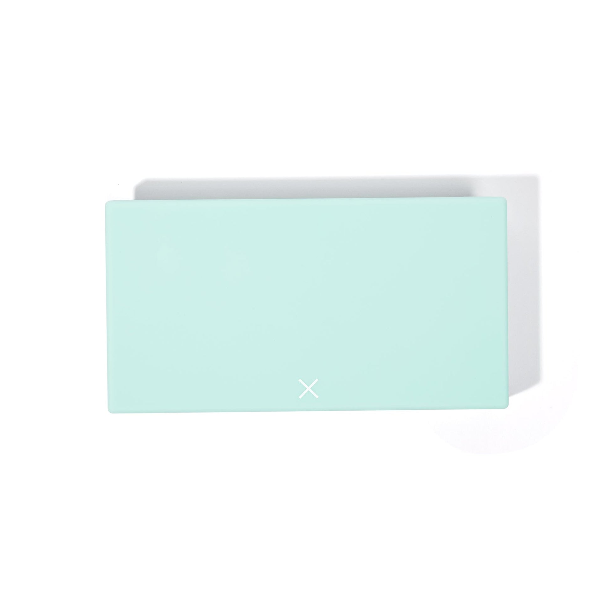 Mint pill box closed front with small X detail