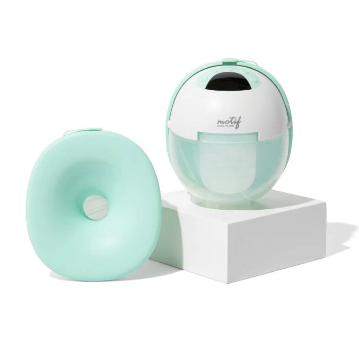 Motif wearable breast pump base with mint collection shield and white pump dome
