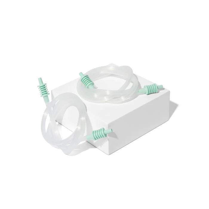 Motif twist double electric breast pump components on box with tubing and shields