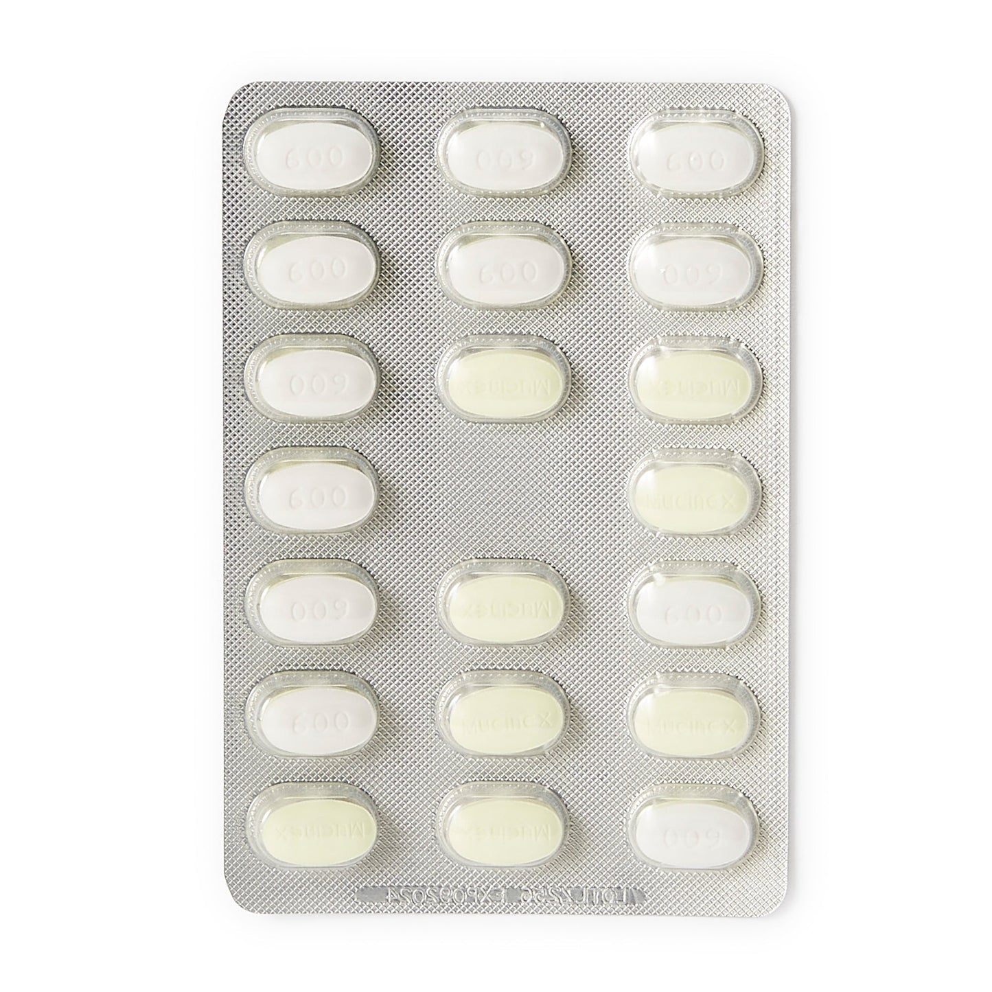 Blister pack of light yellow oval tablets marked for Mucinex DM extended release