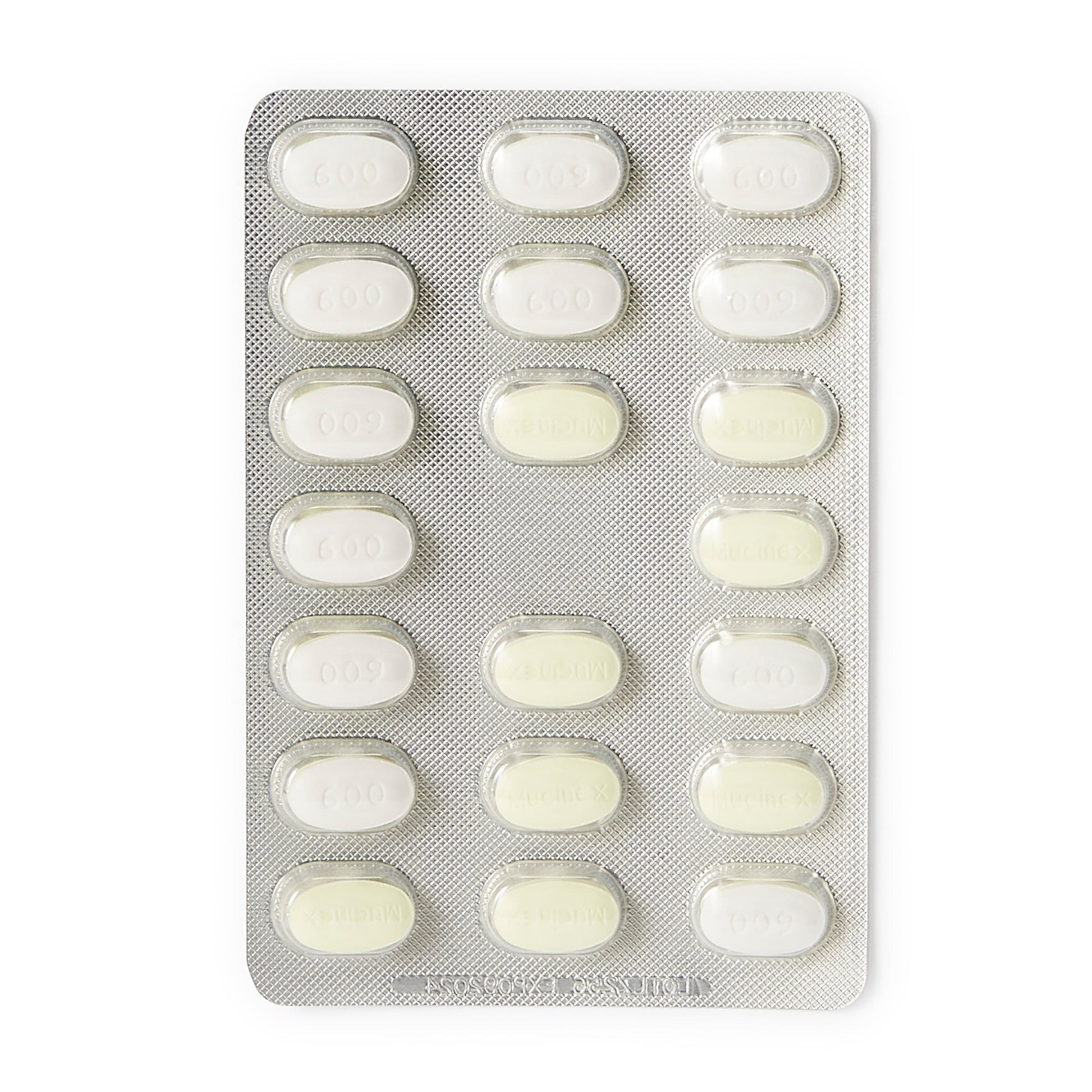 Blister pack of light yellow oval tablets marked for Mucinex DM extended release