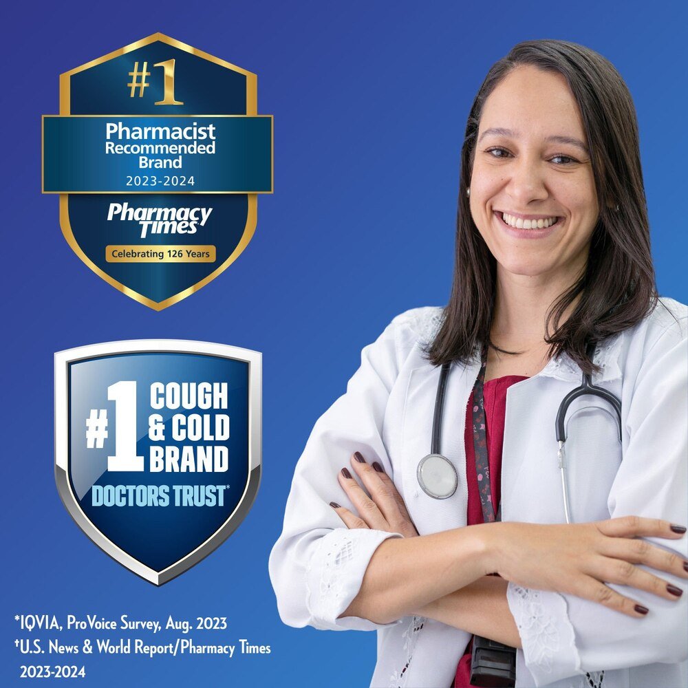 Maximum strength Mucinex Fast-Max liquid for severe congestion and cough, 6 oz bottle, by Mucinex, shown with pharmacist in white coat and stethoscope on blue background.