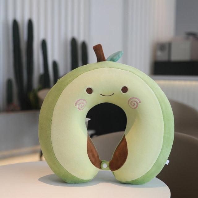 Light green U-shaped animal neck pillow with smiling face and curled tail design