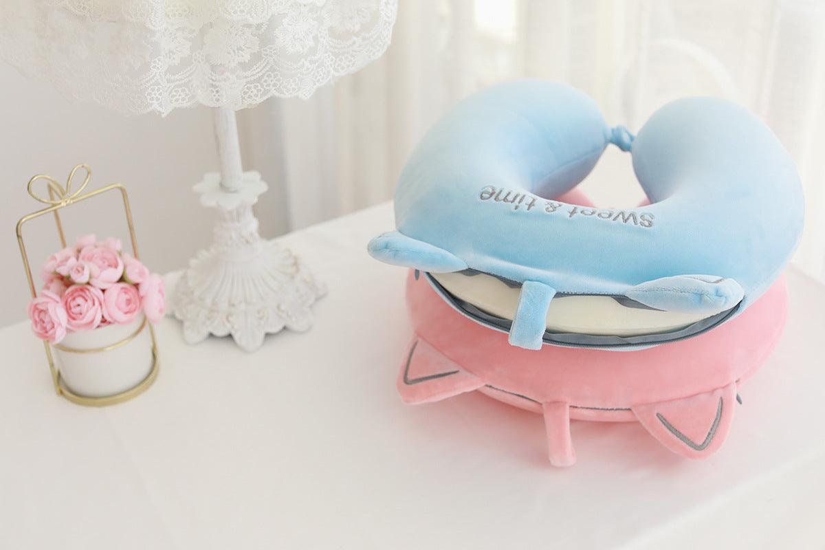 Light blue U-shaped bear neck pillow with front strap and embroidered face