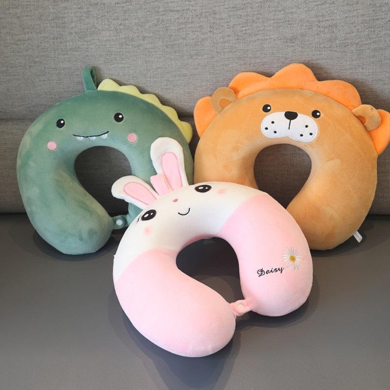 U-shaped plush animal neck pillows set: green dinosaur, orange lion, pink rabbit
