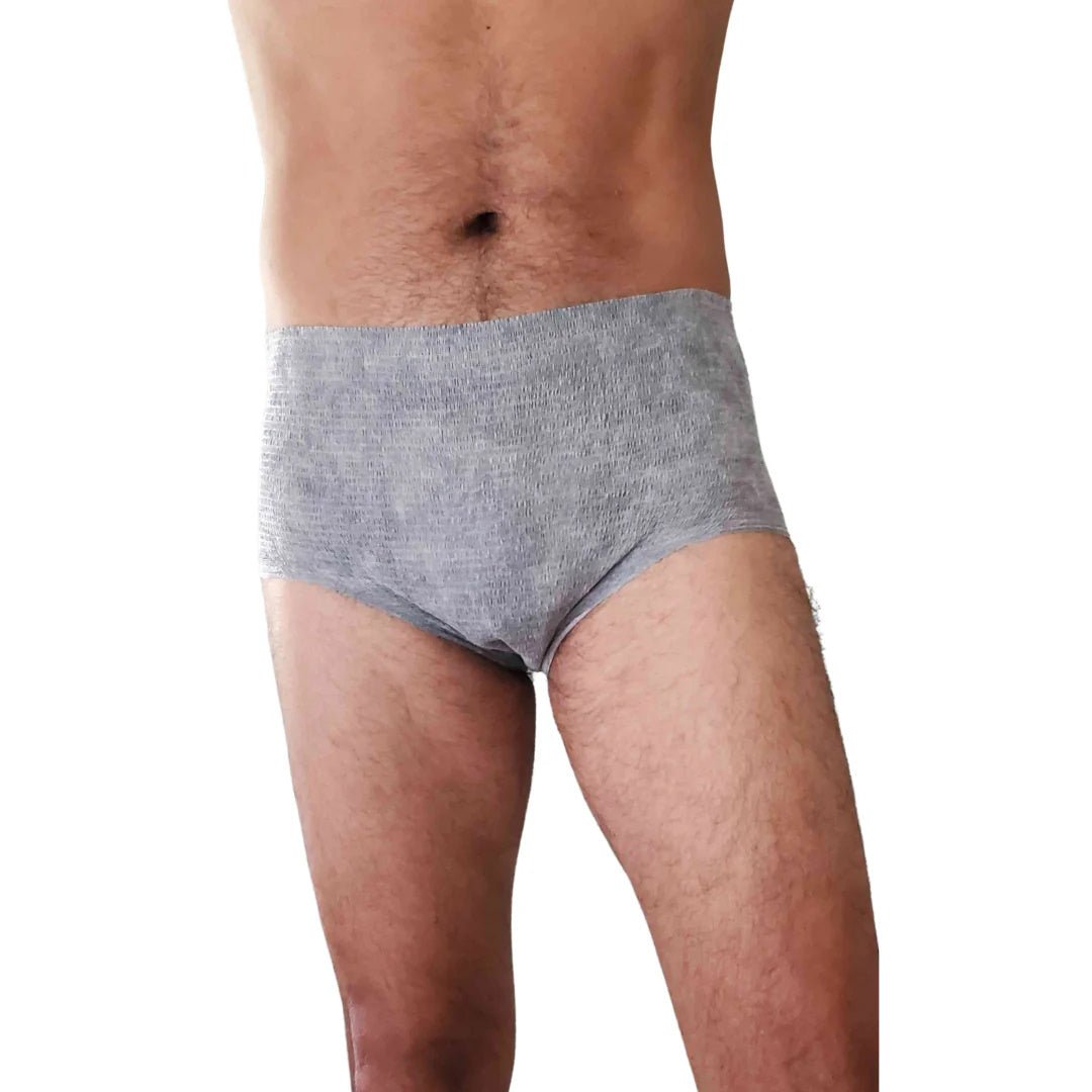 Men’s incontinence underwear, gray knit briefs on model, full-coverage back.