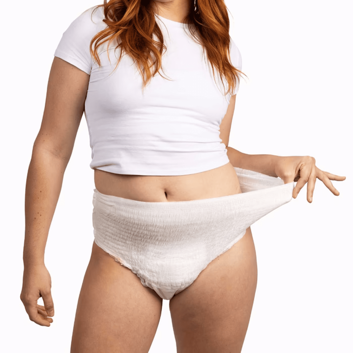 White pull-on underwear on person, front view with waistband and leg openings visible.