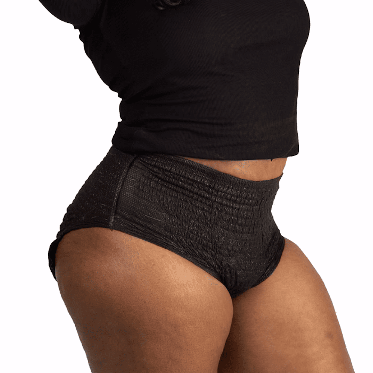 Black textured pull-on absorbent underwear on model, rear view