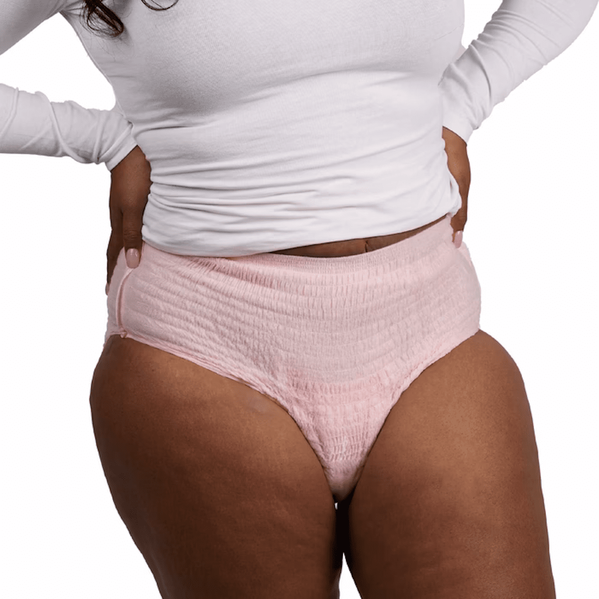 Pink textured pull-on absorbent underwear with elastic waist, side view
