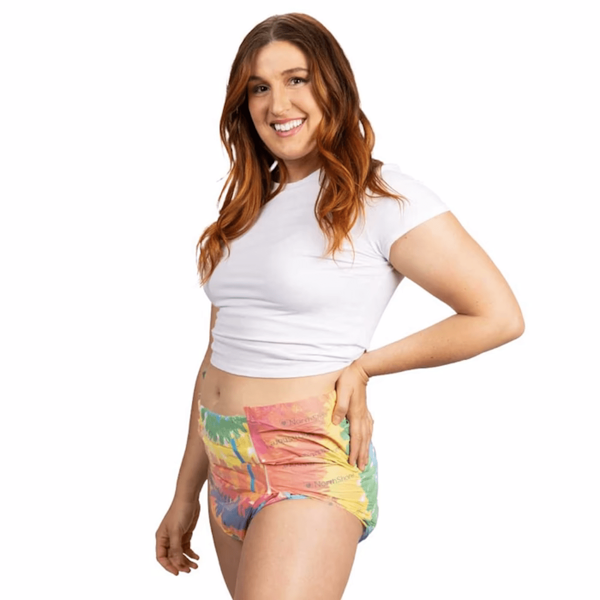 Tie-dye adult diaper brief with elastic waistband, worn with a white T-shirt