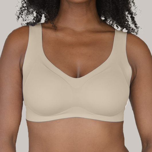 Nude V-neck lift bra with wide straps and smooth molded cups