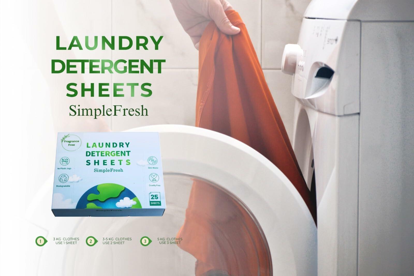 Laundry detergent sheets box near an orange garment in a washing machine