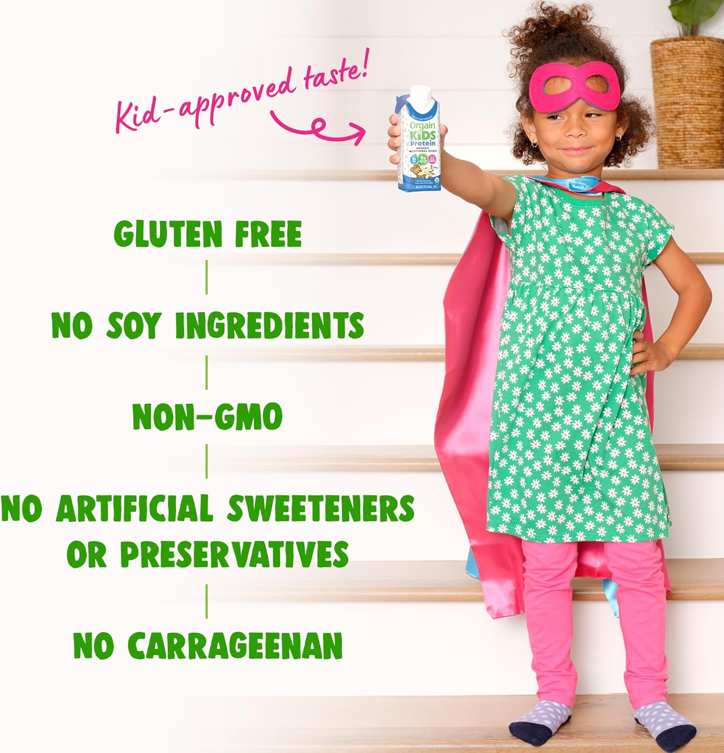 Child holding an Orgain Kids Protein vanilla shake; gluten-free and no soy text