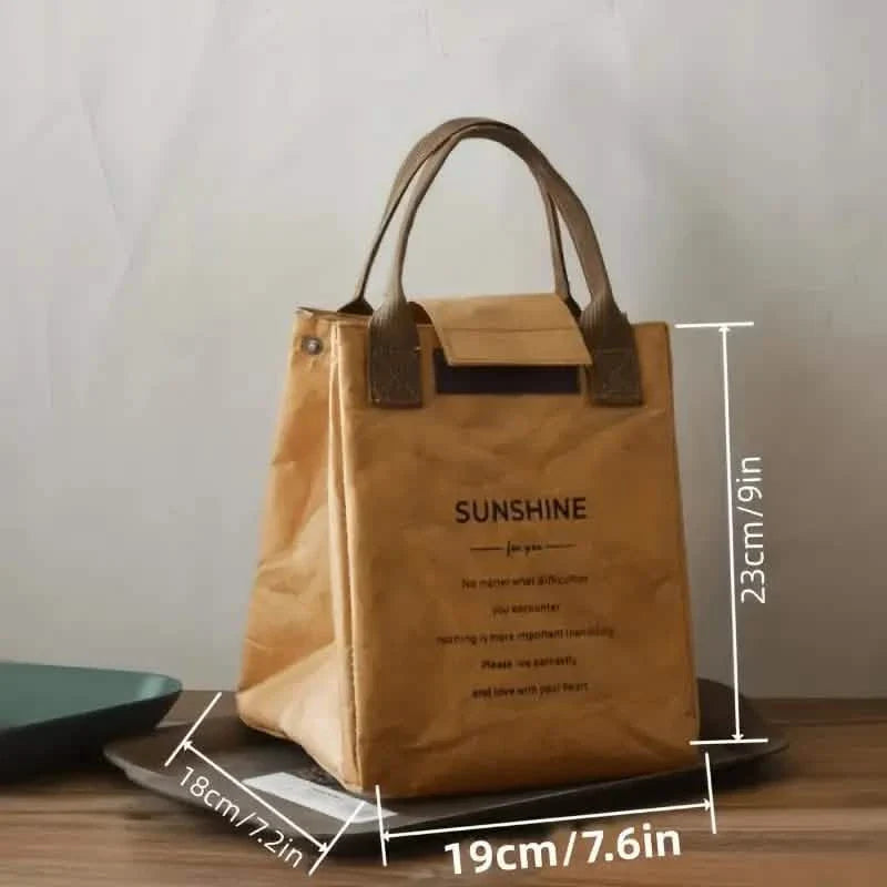 Brown insulated paper bento bag with carry handles and front flap pocket