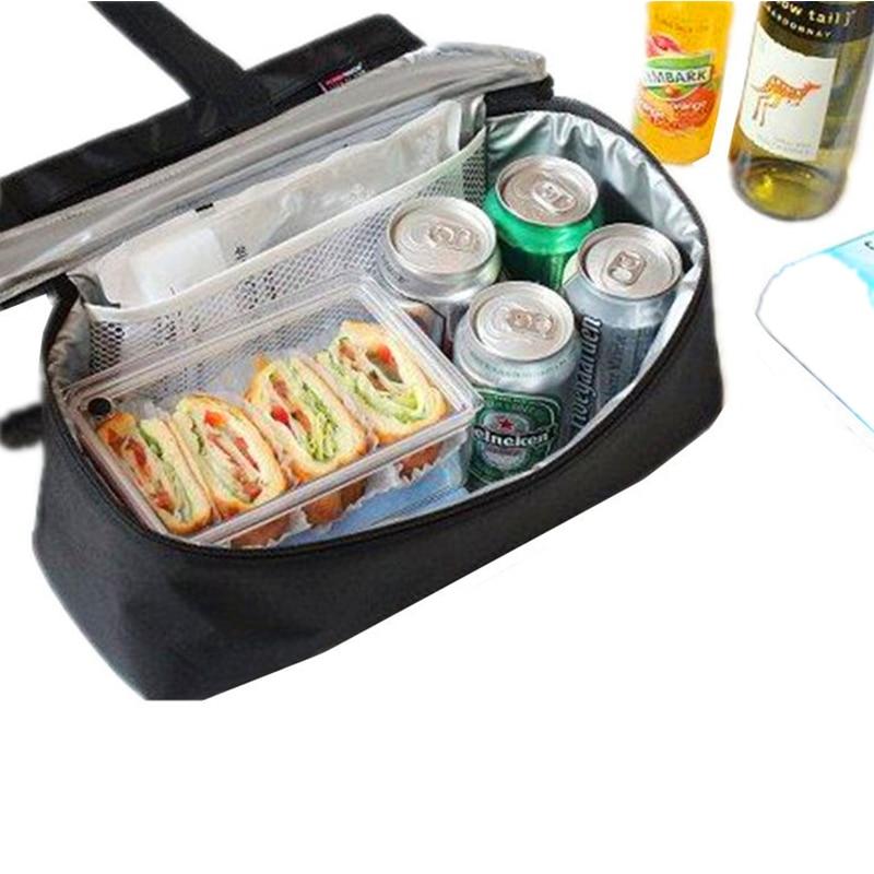 Black insulated picnic cooler bag with open top, mesh pocket, and cans inside