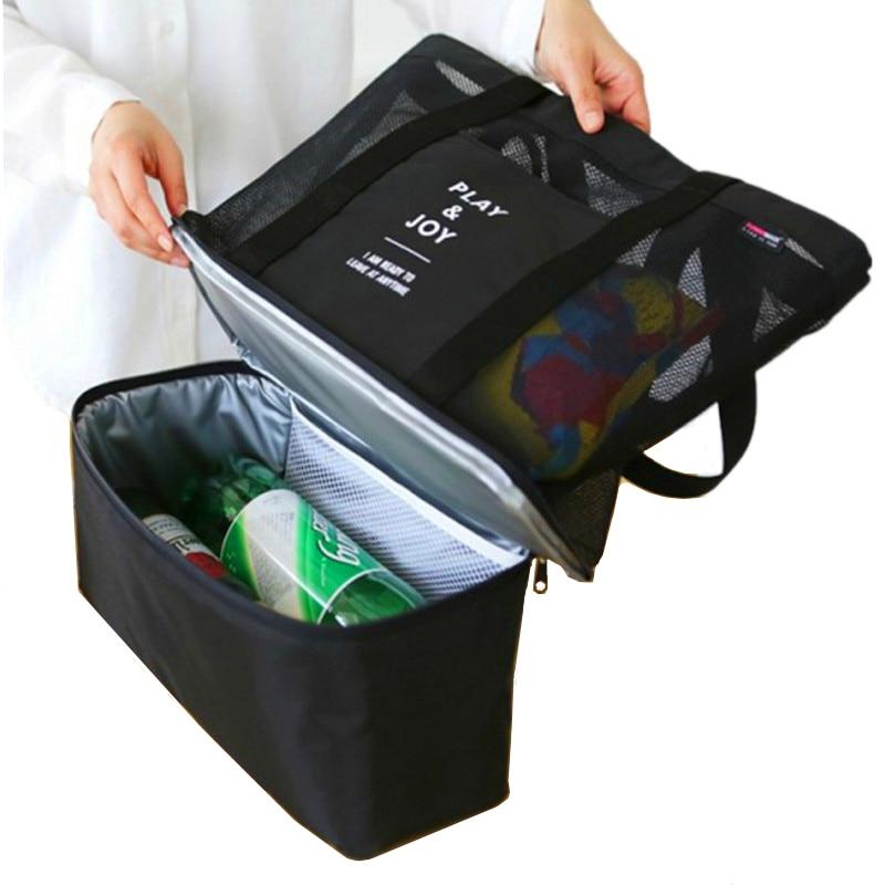 Black insulated lunch cooler tote with zippered mesh lid and interior contents