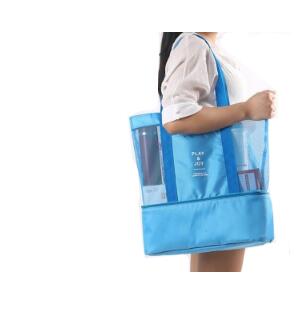 Blue insulated cooler tote with mesh panels and top carry handles