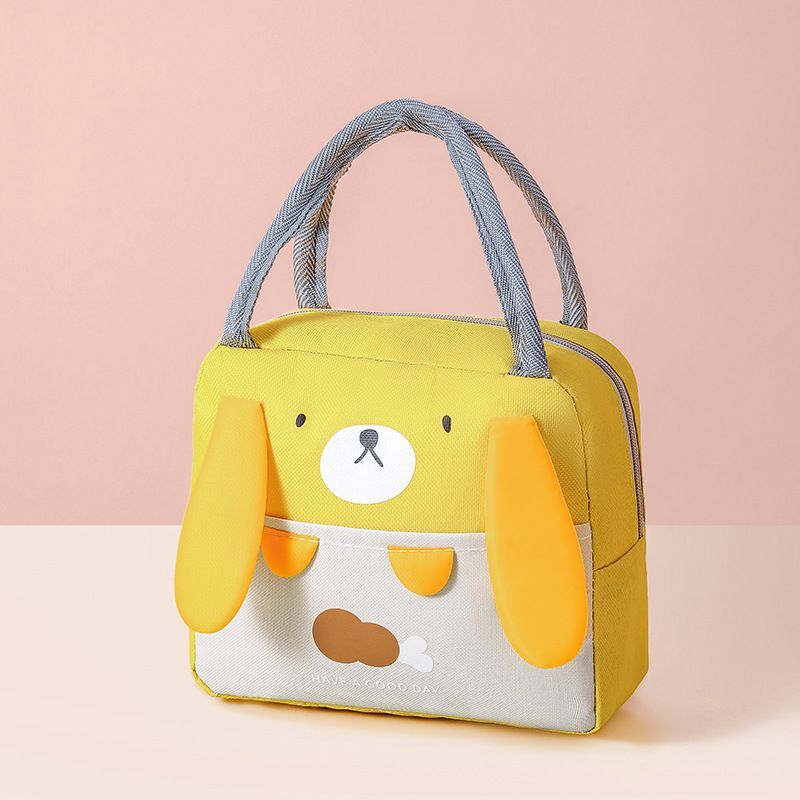 Insulated lunch cooler bag in yellow with cartoon bear face and gray rope handles