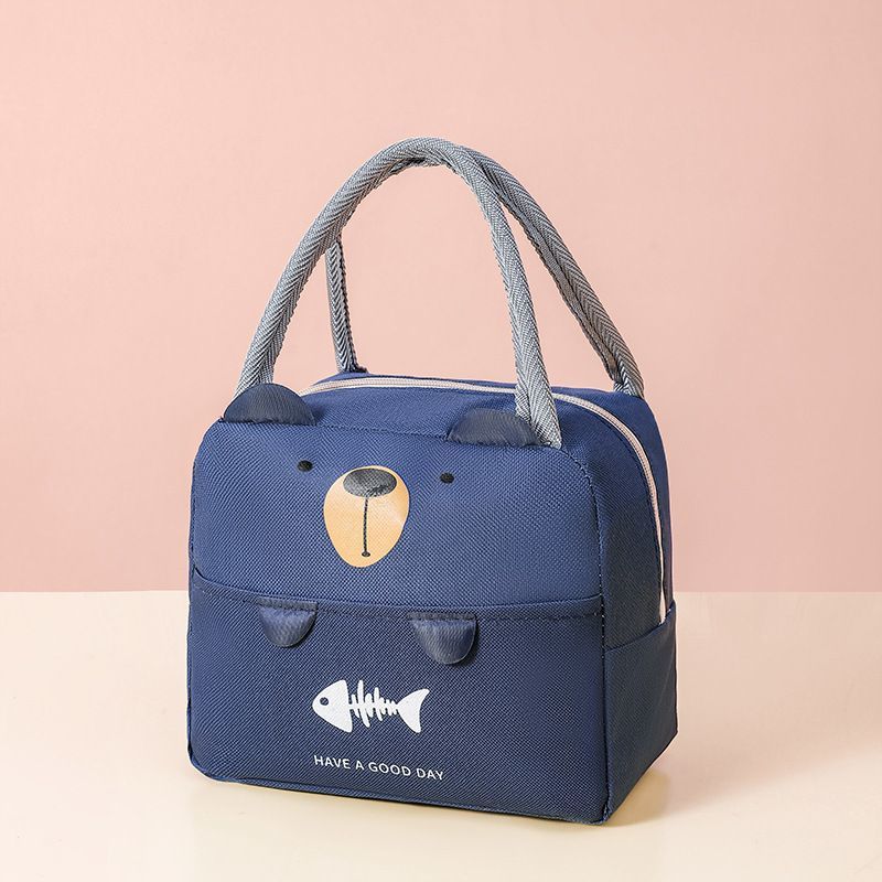 Insulated lunch cooler bag in dark blue with cartoon dog face and gray handles