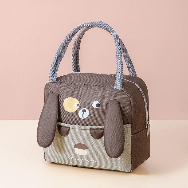 Insulated lunch cooler bag in brown with cartoon dog face and gray rope handles