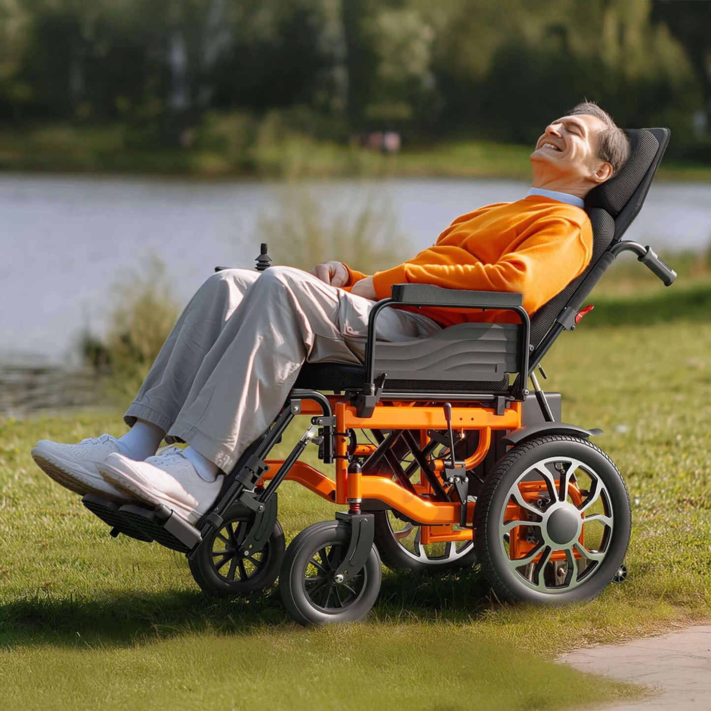 Electric reclining wheelchair with orange frame and gray seatback, side view