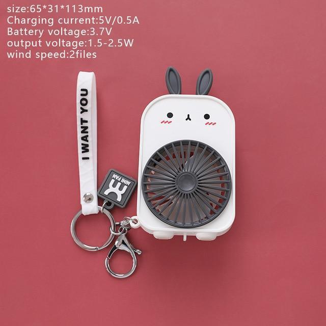 White bunny pocket fan with dark ear accents and keychain lanyard