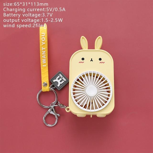 Yellow bunny pocket fan with keychain lanyard, front view