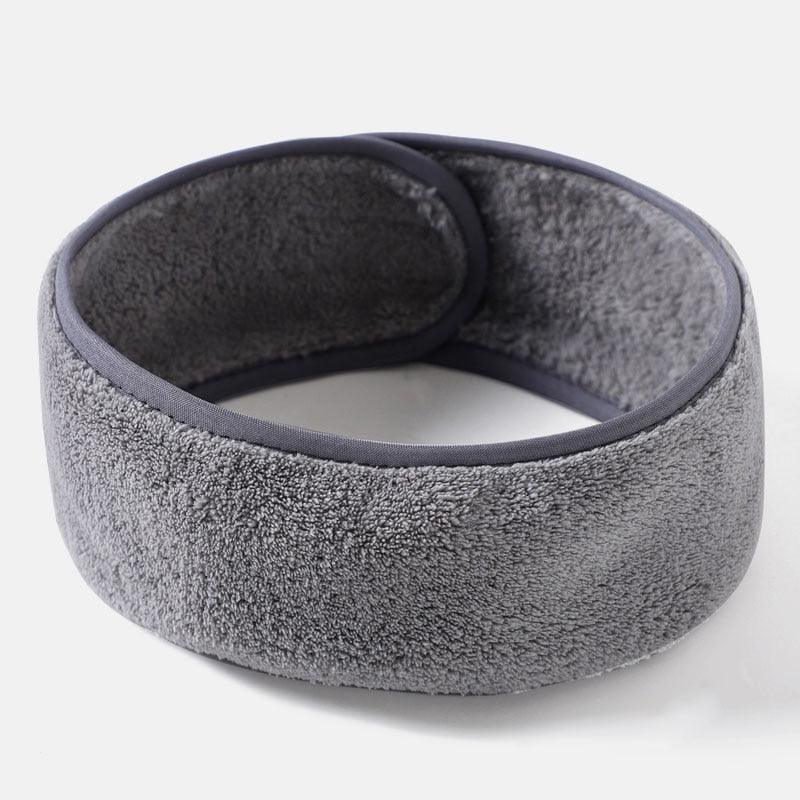 Gray terry cloth facial headband with soft inner lining and cushioned band