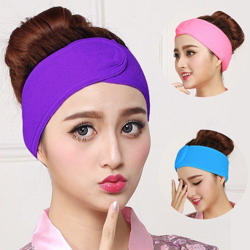 Purple terry face-washing headband with wide cushioned elastic band
