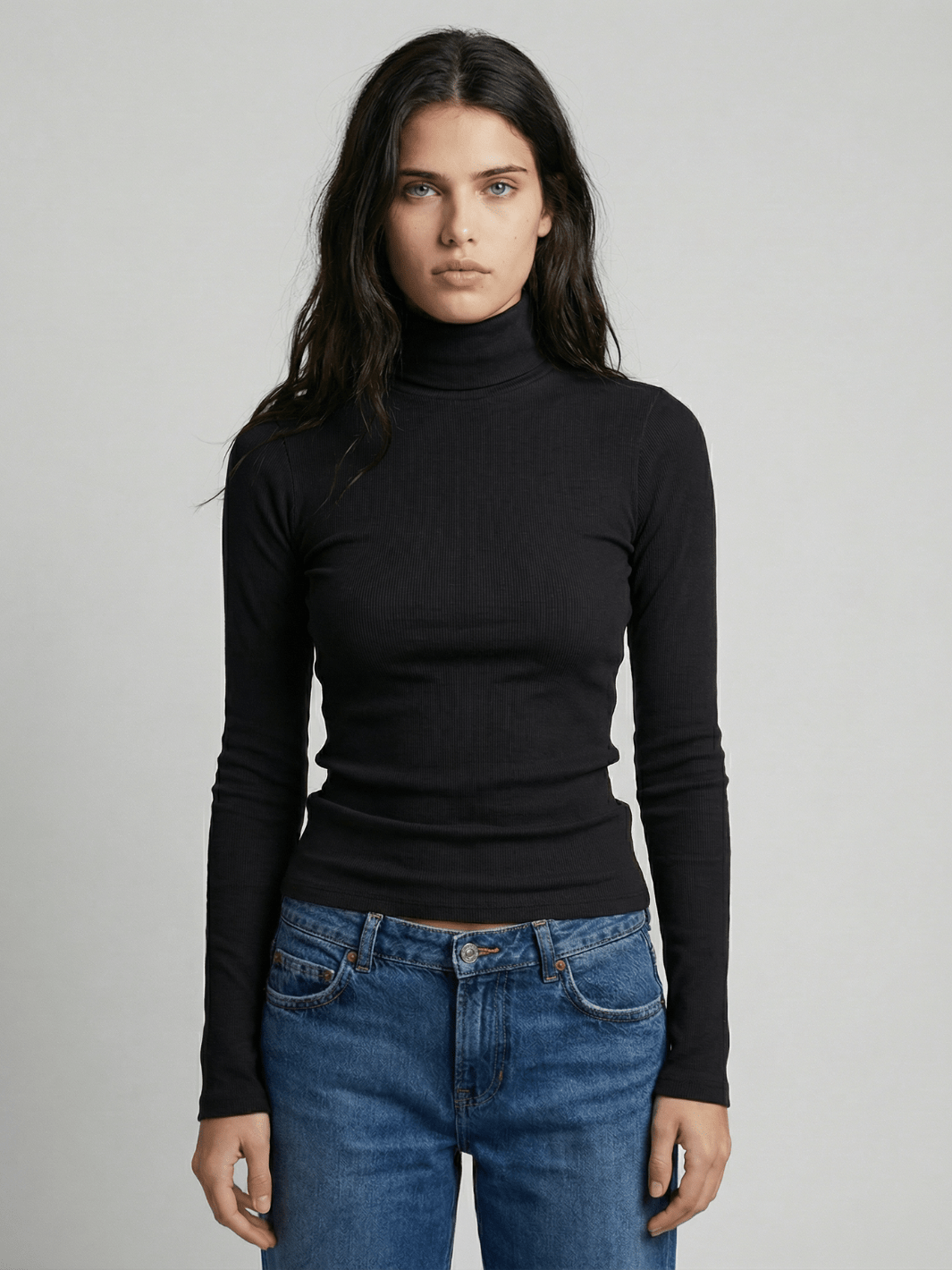Black ribbed turtleneck sweater, long sleeves, high neck, fitted knit