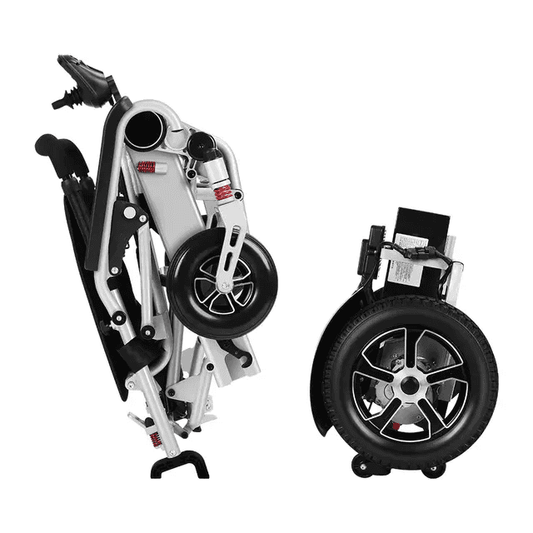 Folded electric wheelchair side view, grey frame, front caster wheels and handlebars