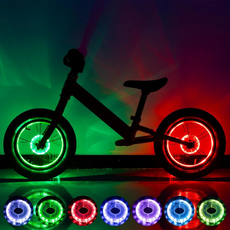 Multi-color LED bike wheel hub light rings with glowing green and red