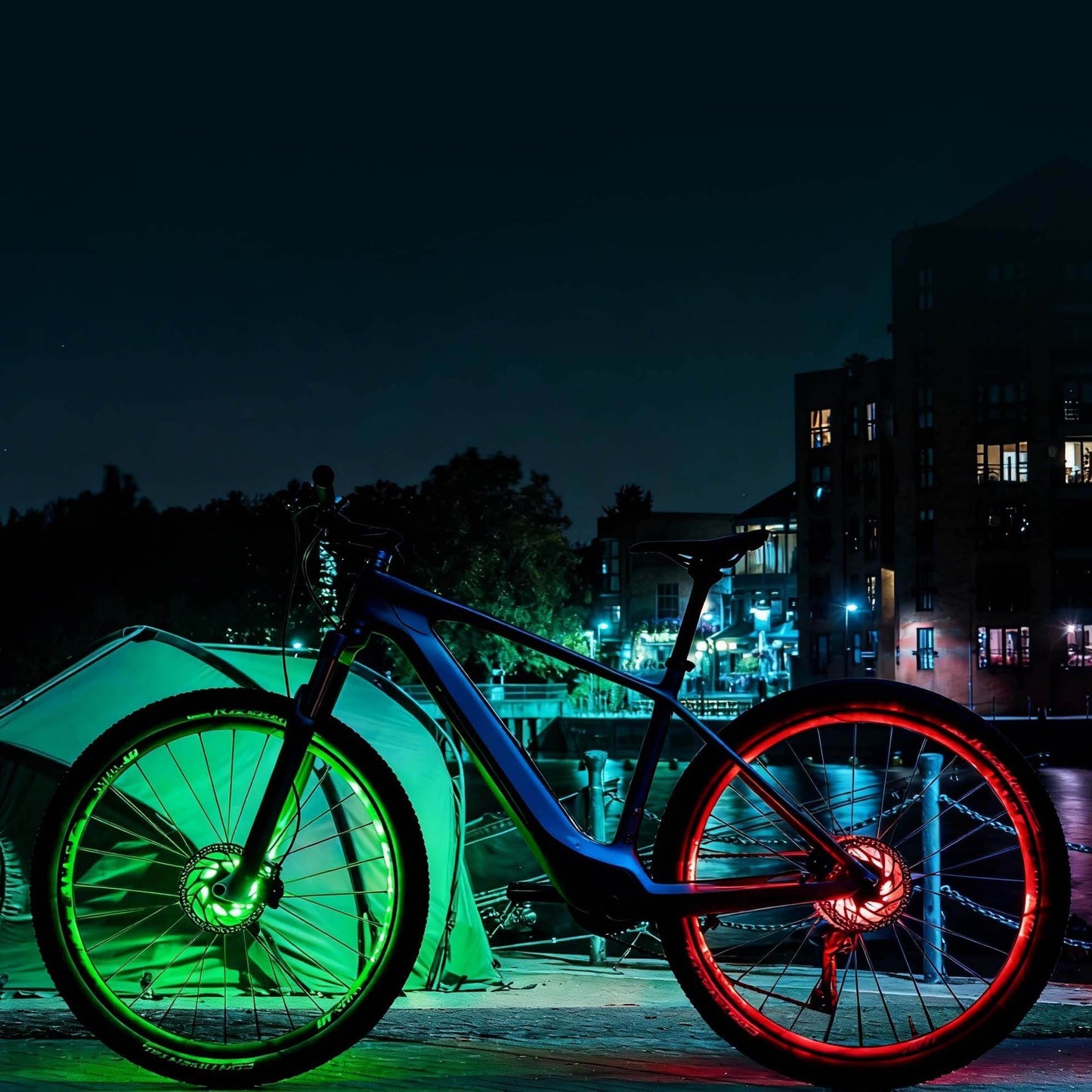 LED bike wheel hub light ring set glowing green on front wheel and red on rear