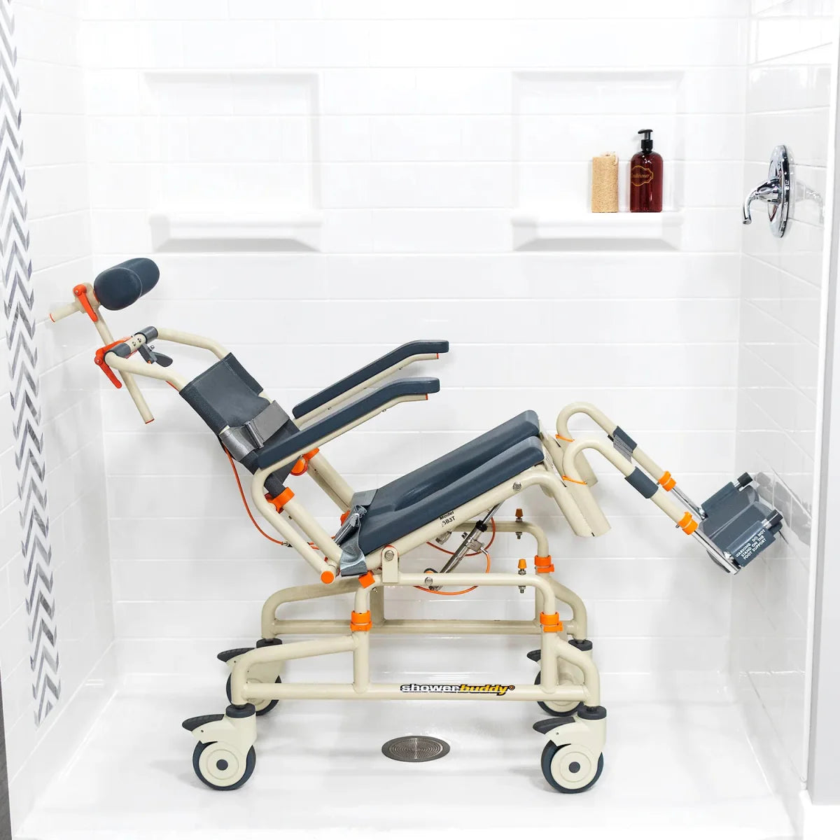 Roll-in shower chair for tub use, dark blue sling seat, side armrests and recline