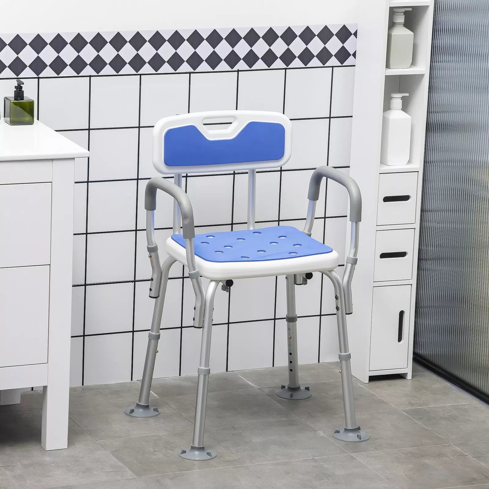 Elderly shower chair with blue seat and back, grey frame, side armrests